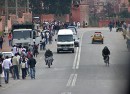 Mainstreet Khenifra * A typical street scene with cars, motos, bicycles, carts, and people in the street. * 576 x 419 * (93KB)
